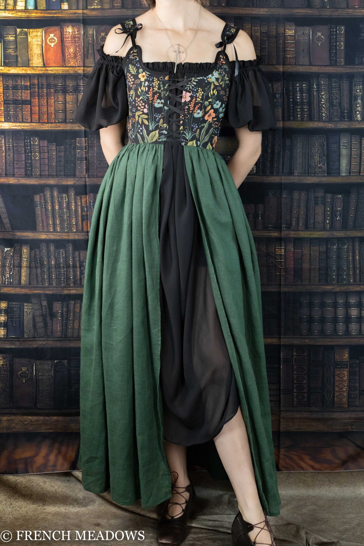 https://www.frenchmeadowscorsets.com/cdn/shop/files/black-botanical-and-green-linen-corset-dress-4-scaled_1445x.jpg?v=1694427006